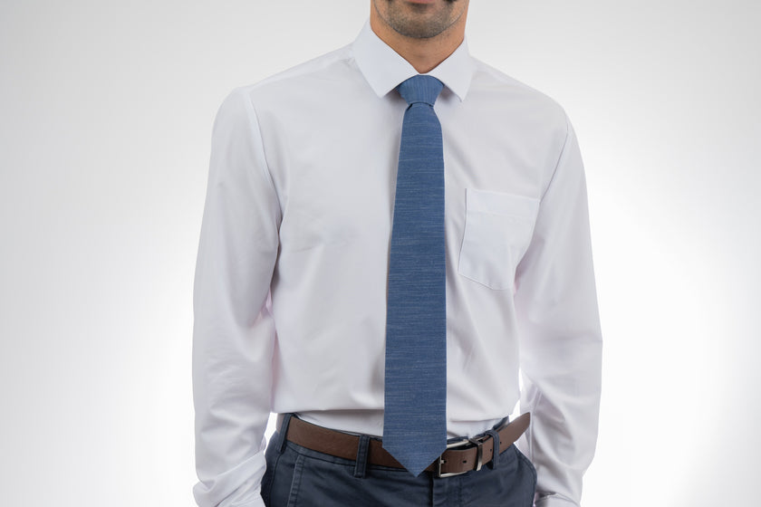 Man wearing a cool, modern, blue necktie