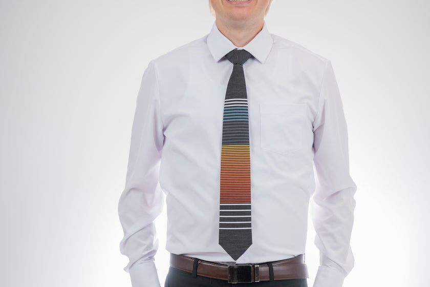 Man wearing a cool, modern, horizontal striped necktie