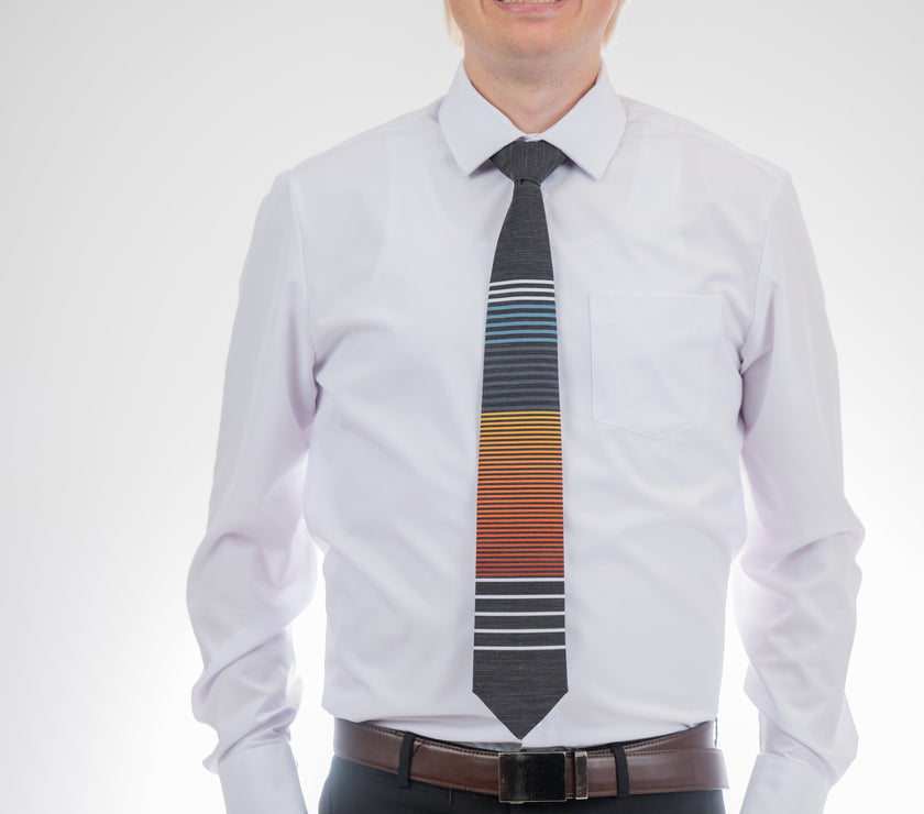 Man wearing a cool, modern, horizontal striped necktie Tie displayed at Kator Shop – luxury men’s accessory made from premium fabric for Utah professionals.