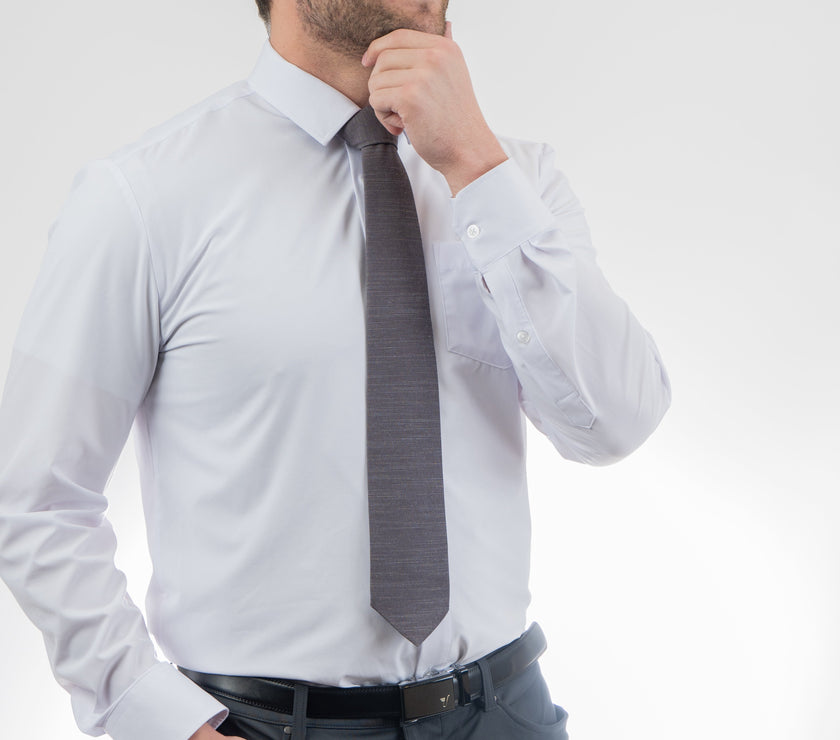Man wearing a cool, modern, charcoal gray necktie