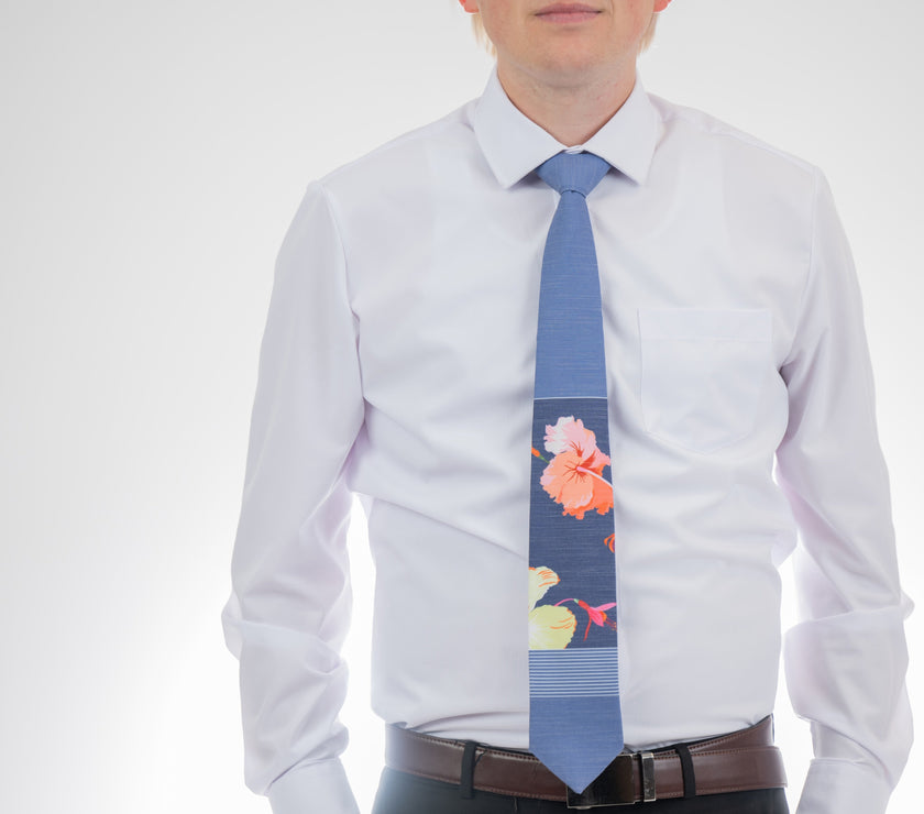 Man wearing a modern, tropical floral necktie