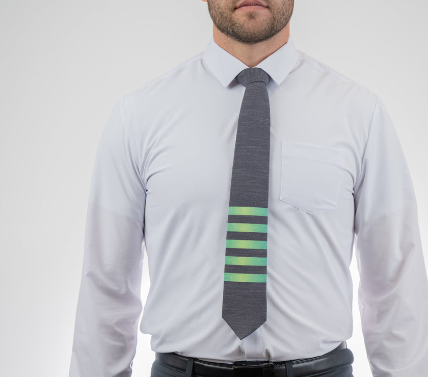 Man wearing a modern, striped necktie Tie displayed at Kator Shop – luxury men’s accessory made from premium fabric for Utah professionals.