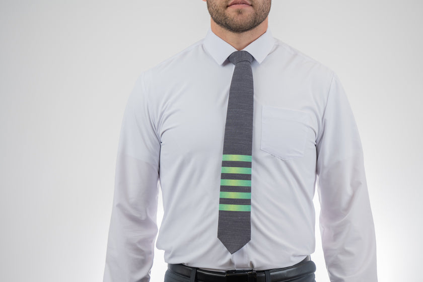 Man wearing a modern, striped necktie Tie displayed at Kator Shop – luxury men’s accessory made from premium fabric for Utah professionals.