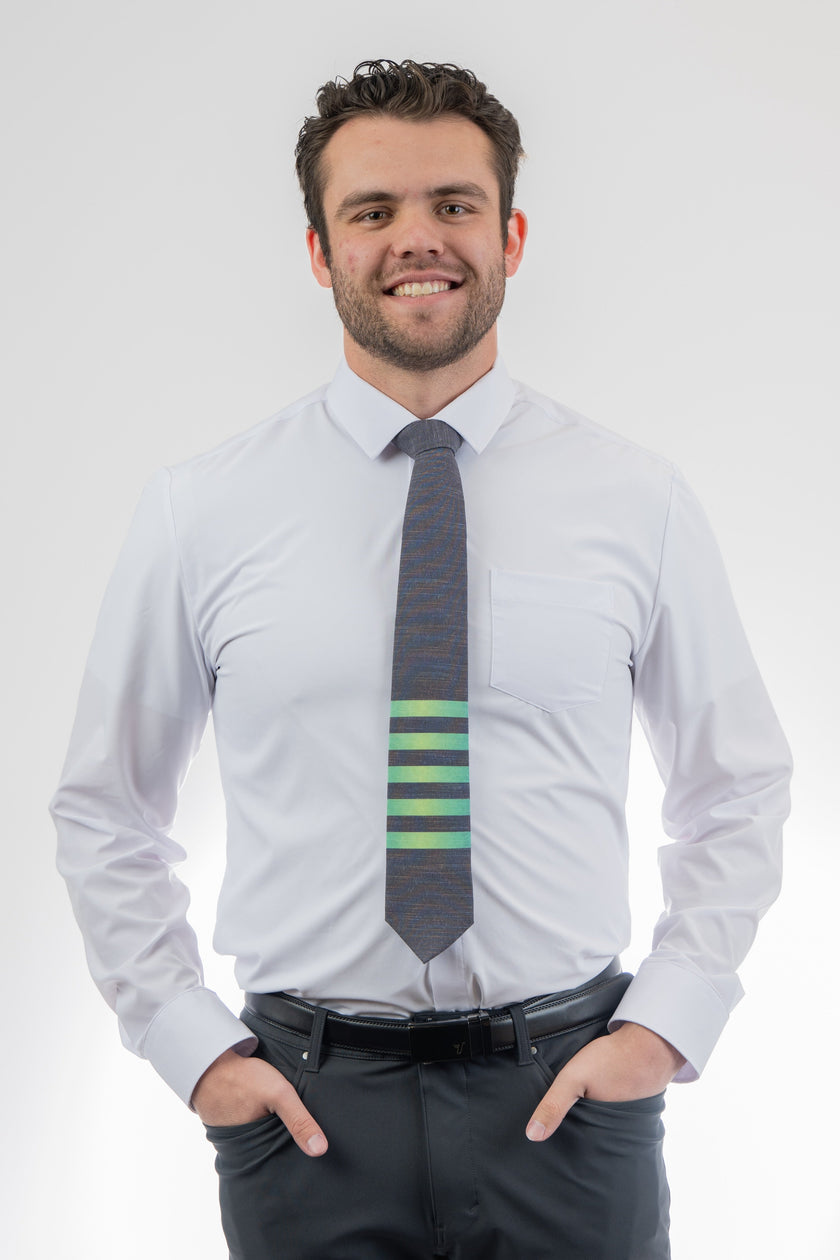 Man wearing a modern, striped necktie Tie featuring rich color and premium stitching – Kator Shop’s high-end accessory for men in Utah.
