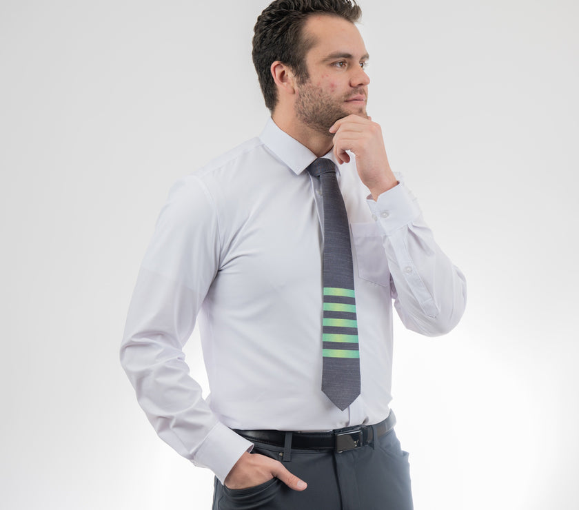 Man wearing a modern, striped necktie Tie handcrafted by Kator Shop – refined Utah menswear piece built to elevate any formal look in Cache Valley.