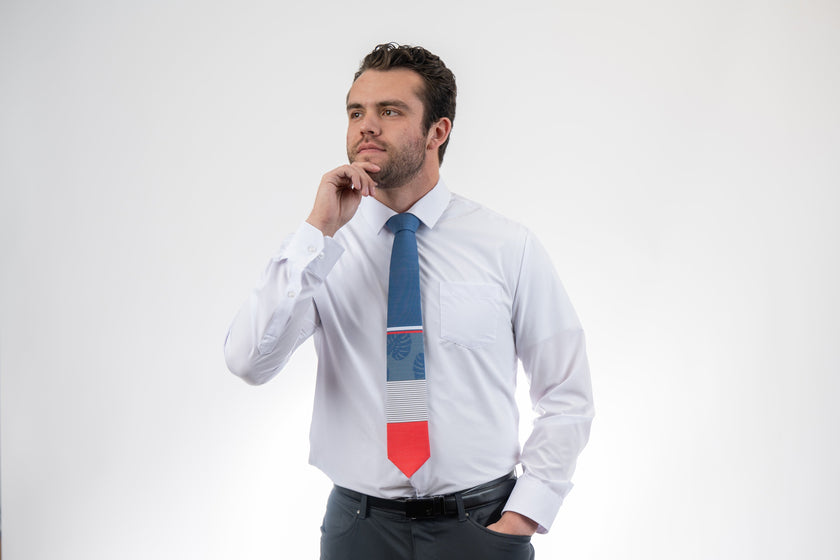 Coral Leaf Lines Men's Tie Sharp prom tie from Kator Shop in Logan, Utah — bold color and luxury texture for a standout prom night look.