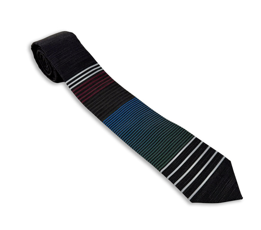 Close up photo of a men's modern, cool, striped necktie