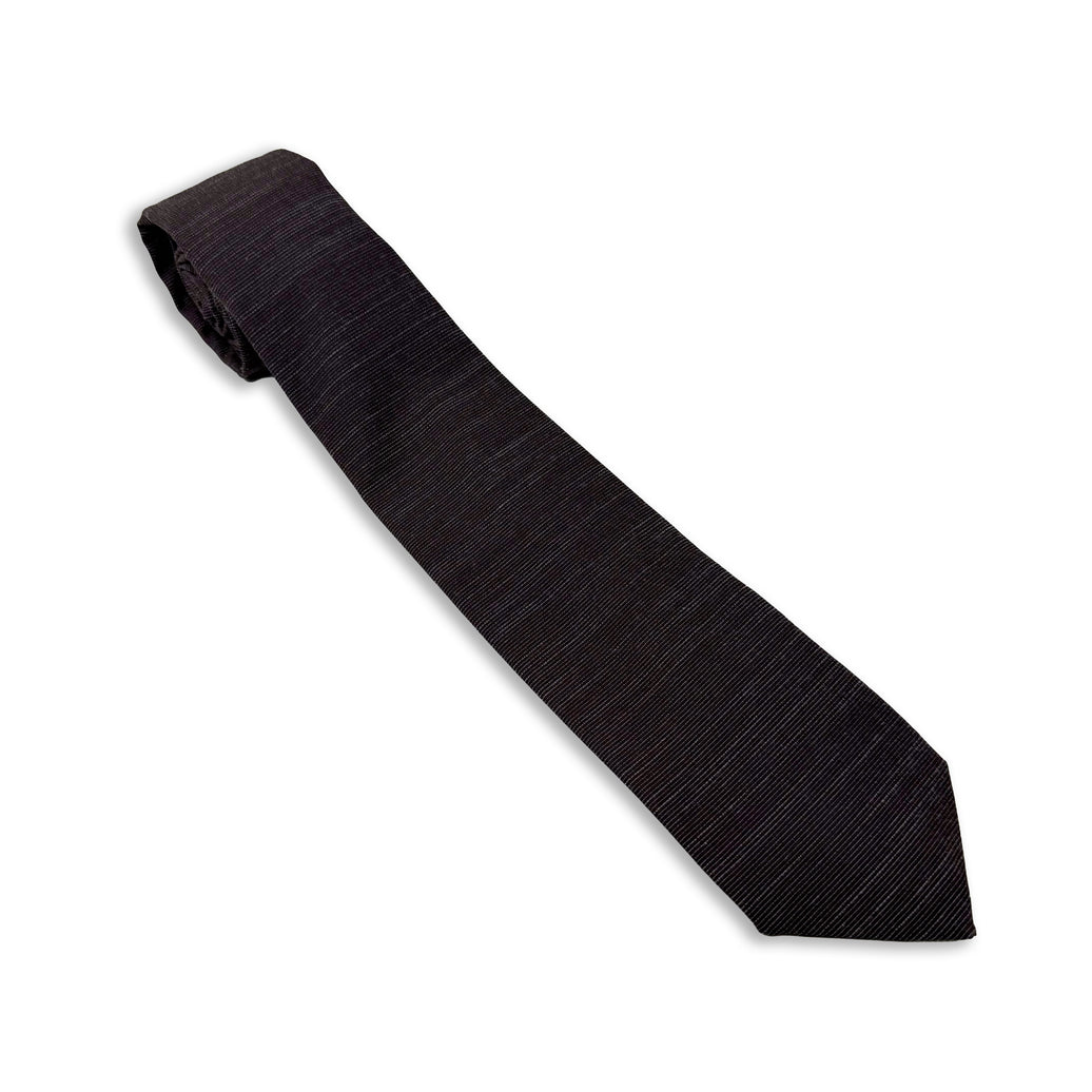 A cool, modern, charcoal gray necktie