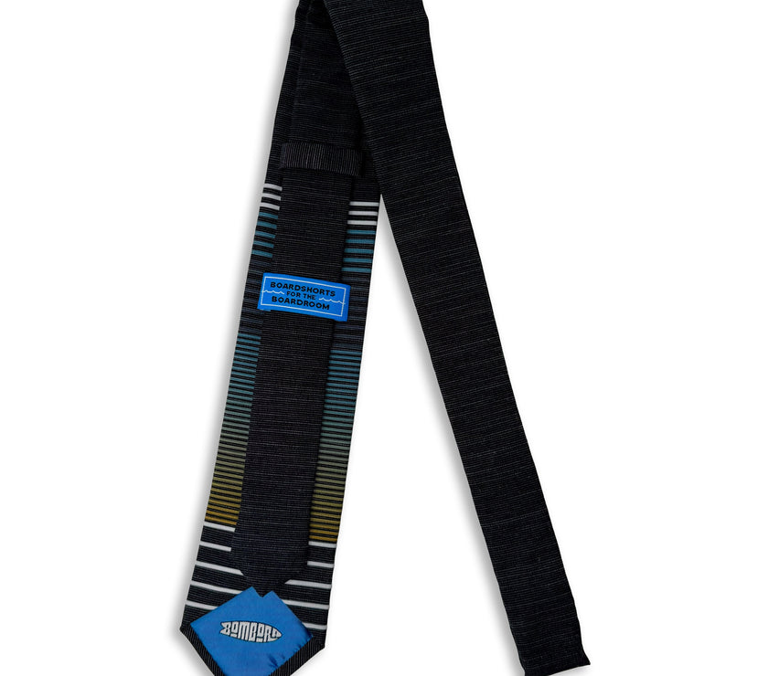 A cool, modern, striped blue and yellow necktie