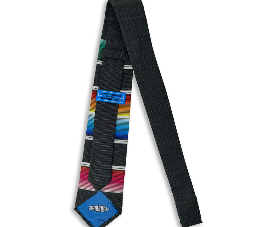 A fun, modern necktie with colorful stripes in the style of a Mexican blanket 
