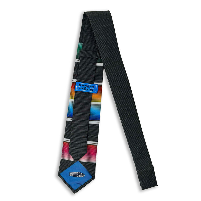 A fun, modern necktie with colorful stripes in the style of a Mexican blanket 