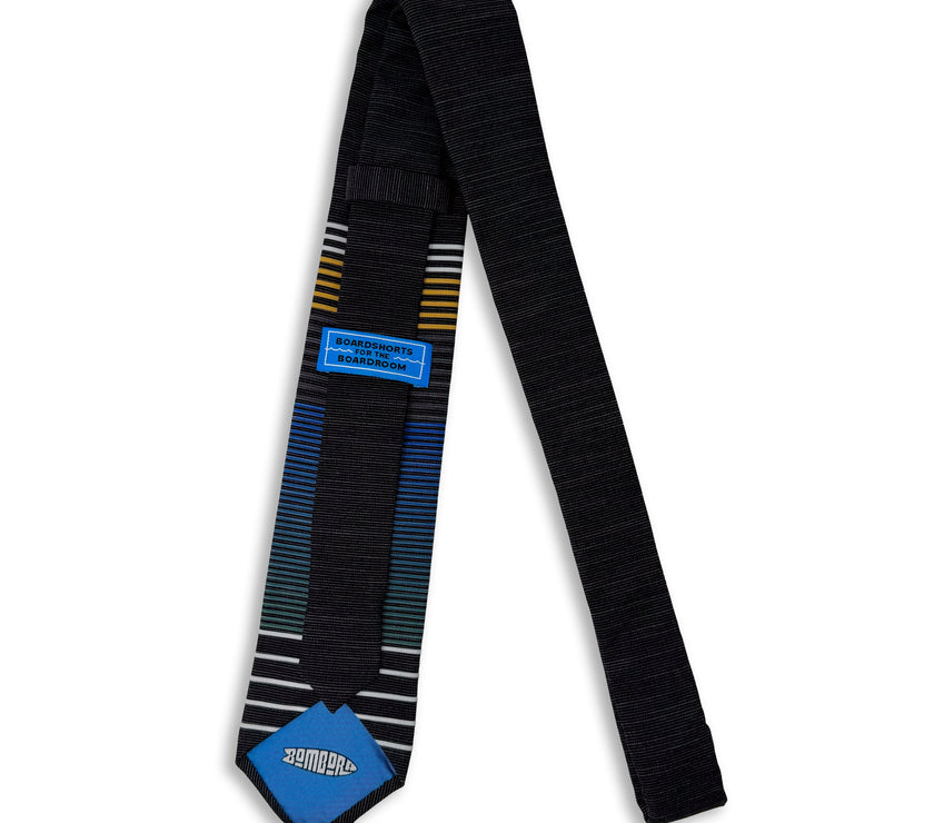 A cool, modern, striped blue and yellow necktie Tie displayed at Kator Shop – luxury men’s accessory made from premium fabric for Utah professionals and missionaries.
