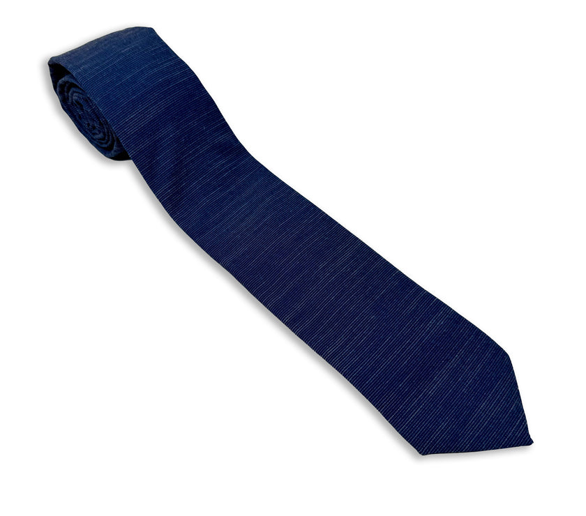 A cool, modern, navy blue men's necktie. Missionary tie built to last through daily wear — crafted in Logan, Utah by Kator Shop for elders serving around the world.