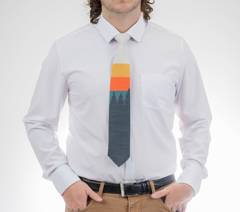 Sunrise Pines (orange-cream) Men's Tie Casual tie designed by Kator Shop — perfect balance of relaxed and refined for Cache Valley men’s fashion.