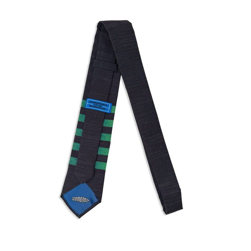 The back of a striped green men's necktie, showing the tiekeeper loop and the tipping Tie designed by Kator Shop – elegant men’s fashion accessory bringing quality and comfort to Utah style.